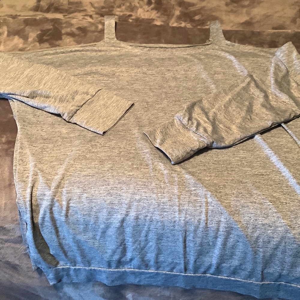 Cute very soft open shoulder shirt with side slits